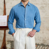 Camisa de Denim de Algodão 'London' com Mangas Longas e Gola Assimétrica" 

"Camisa de Denim 'London' em Algodão com Mangas Longas e Gola Assimétrica