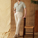 "Camisa Curta de Algodão Seersucker 'Ischia'" can be rewritten as "Camisa de Algodão Seersucker Curta 'Ischia'".