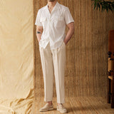 "Camisa Curta de Algodão Seersucker 'Ischia'" can be rewritten as "Camisa de Algodão Seersucker Curta 'Ischia'".