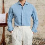 Camisa de Denim de Algodão 'London' com Mangas Longas e Gola Assimétrica" 

"Camisa de Denim 'London' em Algodão com Mangas Longas e Gola Assimétrica