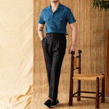 "Camisa Curta de Algodão Seersucker 'Ischia'" can be rewritten as "Camisa de Algodão Seersucker Curta 'Ischia'".