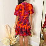 Vestido Mini Skater com Estampa Abstrata em Laranja e Violeta