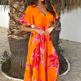Robe Midi Laranja e Rosa com Estampa Floral, Decote em V e Detalhe de Nó