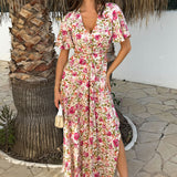 Robe Midi Floral Colorido com Decote em V e Detalhe de Nó