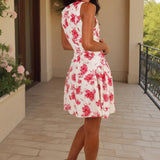 Robe courte plissée à motifs floraux en dégradé de rose et crème