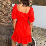 Mini Robe Laranja Brilhante com Mangas Puff e Detalhes em Volantes