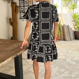 Mini Vestido com Bordados em Preto e Babados na Barra