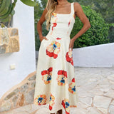 Elegante vestido midi A-line com estampa floral em tom creme e decote quadrado