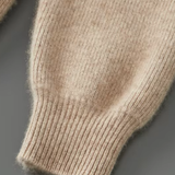 Cardigan de lã merino extra-fina com fechamento e detalhes em ribana