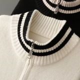Cardigan de lã merino extra-fina com fecho de correr, disponível em duas cores