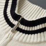 Cardigan de lã merino extra-fina com fecho de correr, disponível em duas cores