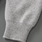 Cardigan de lã merino extra-fina com fechamento e detalhes em ribana