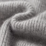 Cardigan de lã merino extra-fina com fechamento e detalhes em ribana