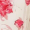 Robe courte plissée à motifs floraux en dégradé de rose et crème