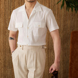 "Camisa Curta de Algodão Seersucker 'Ischia'" can be rewritten as "Camisa de Algodão Seersucker Curta 'Ischia'".