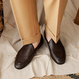 "Sapatos Belgas em Nappa com Almofadas Paris" could be rephrased as "Sapatos Nappa Belgas com Confortáveis Almofadas Paris".