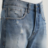 Jeans Clássicos Azuis com Detalhes Rasgados