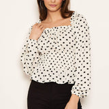 Blusa creme de bolinhas com mangas longas