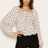 Blusa creme de bolinhas com mangas longas
