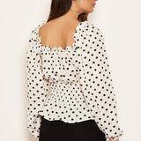 Blusa creme de bolinhas com mangas longas