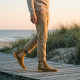 "Botim Aldbury em Couro Suede" can be rewritten as "Botim Aldbury em Suede de Couro".
