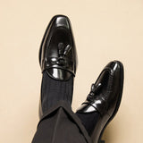 "Citi Loafers de Couro de Vitela com Pompom" pode ser reescrito como "Loafers Citi de Couro de Vitela com Pompom".