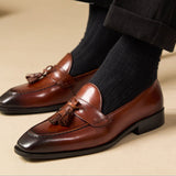 "Citi Loafers de Couro de Vitela com Pompom" pode ser reescrito como "Loafers Citi de Couro de Vitela com Pompom".