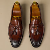 "Citi Loafers de Couro de Vitela com Pompom" pode ser reescrito como "Loafers Citi de Couro de Vitela com Pompom".