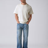 Jeans Azuis Desgastados com Corte Reto