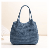 "Saco de Praia Brielle em Palha Trançada" can be rewritten as "Bolsa de Praia Brielle em Palha Trançada".
