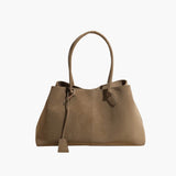 "Geanta Vegan Joan din Suede" could be rewritten as "Geanta Vegan Joan din Material Suede".