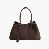 "Geanta Vegan Joan din Suede" could be rewritten as "Geanta Vegan Joan din Material Suede".