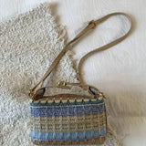 Bolsa Transversal Raphaela em Ráfia Trançada